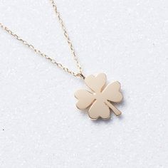 New from Studio Magnifique : 14K Solid Gold Clover Necklace  14K Gold Clover Necklace, Solid Gold Flower Necklace, Four Leaf Clover Necklace, Shamrock Pendant, 14K Gold Luck Necklace ✔Gold Karat: 14K Solid Gold(stamped) ✔Available Color: Gold, Rose Gold, White Gold ✔Length: Various Sizes Are Available ✔Measurements: 10.5 mm - 12.5 mm ✔Beautiful design for you or for gift ✔All metals used in that necklace are 14K Solid Gold ✔Free Domestic Shipping ✔Each order will be packaged in a high quality jewelry box. Multiple orders will be sent in one package, please inform us if you need separate boxes. ✔Choose gift package in check out if it is a gift. Visit our store for other elegant options:  https://studiomagnifique.etsy.com clover necklace14k gold necklacegold clover necklaceclover necklace go Elegant 14k Gold Necklaces For Good Luck, Elegant 14k Gold Necklace For Good Luck, Flower Shape Jewelry As A Gift With Polished Finish, Flower Shaped Polished Jewelry As Gift, 14k Gold Flower Shaped Necklace For Anniversary, Flower Shaped Necklace With 17 Jewels For Gift, Gold Flower Necklace, Luck Necklace, Four Leaf Clover Necklace