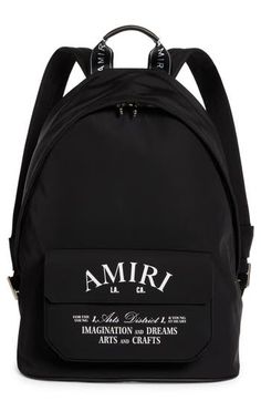 Mike Amiri's LA-streetwear signature shines in this essential backpack cut from fresh, lightweight fabric and boasting an Arts District logo graphic. Two-way top-zip closure Top carry handle; adjustable backpack straps Exterior flap pocket Monogram-print nylon lining Textile Imported Designer Handbags Trendy Backpack For Streetwear With Zipper Closure, Trendy Backpack With Zipper Closure For Streetwear, Trendy Streetwear Backpack With Zipper Closure, Casual Streetwear Bags With Logo Print, Casual Nylon Backpack With Logo, Black Travel Backpack With Logo Hardware, Sporty Bags With Logo Patch For Streetwear, Sporty Logo Backpack For Streetwear, Nylon Backpack With Logo Patch For Streetwear