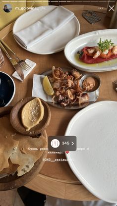 an image of a table setting with food on it