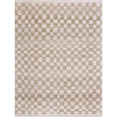 a beige and white rug with checkered squares on the bottom, in different sizes