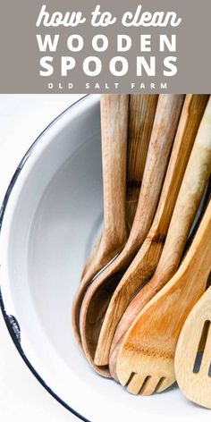 wooden spoons and spatulas in a white bowl with text overlay that reads how to clean wooden spoons