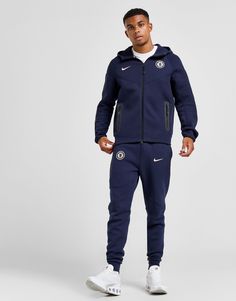 Show your team pride when you layer up in this men's Chelsea FC Tech Fleece Hoodie from Nike. In an Obsidian colourway, this hoodie is made with Nike's ultra-smooth, lightweight Tech fleece fabric for lightweight warmth. With a smooth feel inside and out, it features a full-length dual-zip closure and a hood to amp up the coverage, and long sleeves with a stretchy binding around the trims to secure the fit. With zipped pockets for easy storage, it's finished with signature Swoosh branding to the chest and the iconic Chelsea FC badge. Machine washable. Tech Fleece Hoodie, Tech Fleece, Blue Nike, Chelsea Fc, Jd Sports, Easy Storage, Fleece Hoodie, Fleece Fabric, Binding