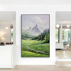 a painting hanging on the wall in a living room