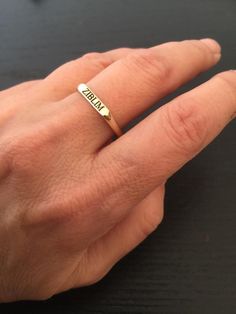 "Pinky ring, Engraved ring, Initial Ring, Personalized Ring, Stacking Ring 14K solid gold ring. delicate, dainty and light Black Engraved letter/s, word, name in any language Can be set with a delicate zircon on the side Choose your size , and your word / name - in any language let me know in the \"note to seller\" during checkout what you want. The product will arrive to you packed in gift box and padded envelope to maintain the product Our jewelry are water resistant and comes with 1 year warr Personalized Adjustable Signet Ring For Promise, Adjustable Promise Ring With Engraved Text, Custom Name Engraved Open Ring For Promise, Engraved Meaningful Promise Rings, Custom Name Engraved Open Promise Ring, Adjustable Engraved Text Ring, Minimalist Personalized Signet Ring For Promise, Yellow Gold Hand Stamped Promise Ring, Custom Name Meaningful Promise Ring