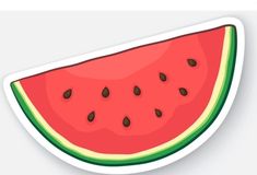 a piece of watermelon sticker sitting on top of a table