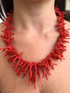 "Red Coral fringed Necklaces mounted on silver 925 . -Given the authenticity of the product, both the shape and the workmanship may vary, making each piece of jewelry unique. A richly fringed necklace of Mediterranean coral in a magnificent colour. Red coral is connected to the first chakra, the root chakra stimulates vital energy and vitality. It eliminates energy imbalances due to negative moods, opens the heart with the power of love and is considered a stone of sensuality and affection.  Coral is a colony of living microorganisms in a calcareous formation that grows in the form of a small tree at depths of 50 to 150 metres Coral has fascinated mankind since ancient times and its origin has been a source of speculation among early naturalists for centuries. Many people believed that cor Coral Necklace Outfit, Unique Handmade Coral Necklace, Luxury Red Coral Necklaces, First Chakra, Red Coral Hand-strung Necklace, Ocean Ecosystem, Eccentric Style, Necklace Outfit, Unique Hand-strung Red Coral Necklaces