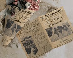 an old newspaper is laying on the ground next to some flowers and other things that are in front of it