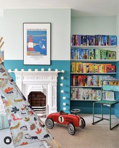 a child's bedroom with a teepee tent and toys