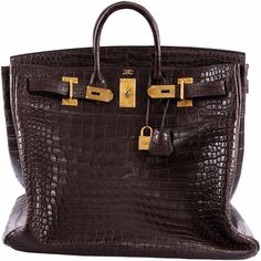 Words do not describe this incredible 50cm HAC Birkin in Ebene Porosus Crocodile. A world class travel bag that will make a statement unlike any other. Spectacular Investment Bag opportunity. The HAC Birkin. The Haut à Courroies, (which translates as “high belts”) bag, is very similar to the Birkin but proportionally taller with slightly shorter handles. ... It is much sought after by  Hermès connoisseurs as well as celebrities and makes an especially stylish travel bag. Porosus crocodile is the most luxurious exotic skin from  Hermès. It is created by polishing the spots with agate for a"Lisse Finish"to the leather of crocodile known as “salt water crocodiles” inhabiting in brackish waters and originating from Australia and Southeast Asian countries such as Singapore. Australian Saltwater Hac Birkin, Stylish Travel Bag, Saltwater Crocodile, Investment Bags, Bronze Hardware, Hermes Handbags, Crocodiles, Hermes Bags, World Class