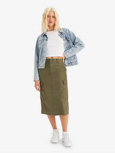 Your favorite cargos;in skirt form. With an ultra-flattering mid rise and a relaxed, loose fit, our Cargo Midi Skirt features oversized patch pockets and effortless '90s style. A throwback cargo skirt With an ultra-flattering mid rise and a loose fit Features oversized patch pockets This lightweight garment is made from supersoft, ultra-comfortable fabric Olive Midi Skirt Outfit, Olive Green Skirt Outfit, Green Cargo Skirt Outfits, Army Green Skirt Outfit, Khaki Skirt Outfits, Green Skirt Outfits, Cargo Skirt Outfit, Cargo Midi Skirt, Army Green Skirt