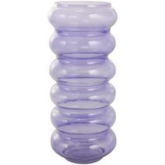 a tall purple vase sitting on top of a white table