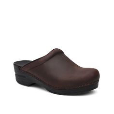 Dansko-Sonja Clog The Sonja clog by Dansko is all you need to look and feel good. Oiled leather, airy single-density open synthetic foam sockliner, contoured midsole and supportive sole make this stapled clog a must-have. Synthetic Clogs With Ortholite Insole For Outdoor, Slip-on Closed Toe Synthetic Clogs, Comfortable Closed Toe Synthetic Clogs, Slip-on Synthetic Closed Toe Clogs, Comfortable Synthetic Closed Toe Clogs, Slip-on Synthetic Clogs With Closed Toe, Leather Slip-resistant Clogs For Outdoor, Synthetic Slip-on Clogs With Closed Toe, Brown Clogs For Outdoor