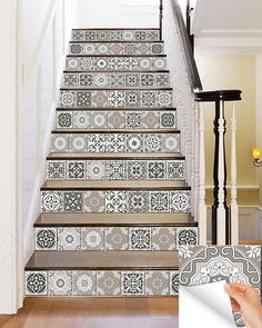 the stairs are decorated with decorative tiles