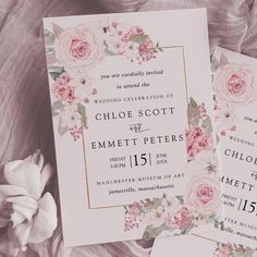 wedding stationery with pink flowers and greenery