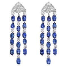 This is an elegant and classic blue sapphire earrings, with timeless accents using white diamonds set in white gold. A timeless piece that will hold value for generations... Blue Sapphire Earrings with White Diamond in 18 Karat White Gold Blue Sapphire: 19.074 carats, oval and pear shape. Diamond: 2.491 carats, round shape, G color VS clarity. Gold: 19.33g, 18K white gold. Butterfly pin and push. E332 Blue Sapphire Earrings, Stunning Aesthetic, Jewelry Design Drawing, Butterfly Pin, Cultured Pearl Necklace, Expensive Jewelry, Naha, Emerald Earrings, Gold Butterfly