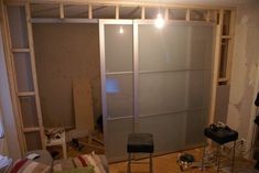 a room that is being remodeled with glass doors