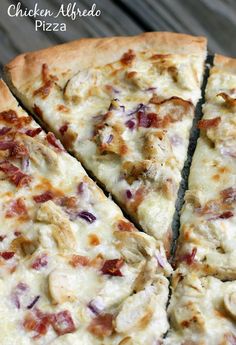 a chicken alfredo pizza is cut into slices