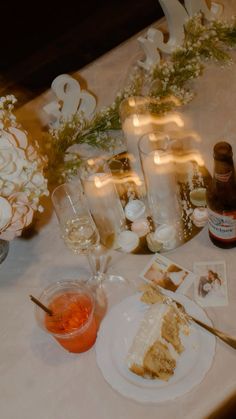 a table topped with lots of food and drinks