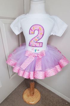 Tutu BIRTHDAY SPRINKLE Themed DRESS For Kids Wear - Personalized Baby Girl Two Sweet Party Dress  This outfit is sprinkle themed. Perfect for a two sweet party. The shirts are 100%  ring spun combed cotton & run true to size. This shirt is available is short sleeve & long sleeve Any birthday can be added to the shirt!! This shirt is boutique style This shirt is EMBROIDERED! Any age can be added to the shirt. A name can be added to the bottom of the shirt also. This set will include the shirt, tu Playful Purple Tutu Dress For Birthday, Sweet White Tutu Dress For First Birthday, Spring Birthday Tutu Dress With Short Sleeves, Short Sleeve Tutu Dress For Spring Birthday, White Sweet Tutu Dress For Birthday, Sweet White Tutu Dress For Birthday, Spring Short Sleeve Tutu Dress For Birthday, White Dress For Easter Birthday, Playful White Tutu Dress For Birthday