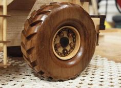 a close up of a wooden toy truck