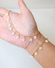 This seed bead flower bracelet is available in four lovely pastel shades: baby blue, light yellow, baby pink, and white. Pick your favorite color or collect all 4! Bracelet Length - approx. 6.5 inches (16.5 cm) with Extender chain - approx. 8 inches (20 cm) ⊹  Price is for ONE bracelet. ⊹  Since this is a handmade product, thread/string may be visible. ⊹  Colors may vary depending on the lighting and screen settings. ⊹  Each one is individually made so no two pieces are exactly the same.  ⊹  The Thread Bead Bracelets, Cute Bead Bracelet Ideas, Handmade Bracelets Thread, Yellow Beads Jewelry, Beaded Jewelry Inspiration, Cute Handmade Bracelets, Small Bead Bracelets Ideas, Seed Bead Flower Bracelet, Small Beads Bracelet