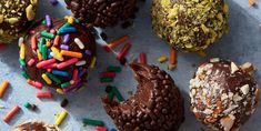 chocolate covered donuts with sprinkles and confetti