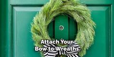 a green door with a black and white wreath on it that says attach your bow to wreaths