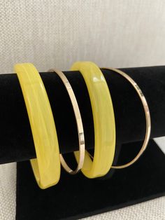 Versatile Yellow + Gold Plated 4 Piece Women's Bracelet Set Mix and Match Yellow Resin + Gold Plated 4 Piece Bangle Includes 2 Yellow Bangles & 2 Gold-Plated Bangles Yellow Resin Statement Gold Bangles Gift For Her Internal Diameter: 2.6 Inches Wide (Fits Most) Ships Free From A Small Business in Texas Yellow Bangles, Modern Bangle, Yellow Resin, Gold Plated Bangles, San Antonio Tx, Mix N Match, Gold Bangles, Mix And Match, Bracelet Set