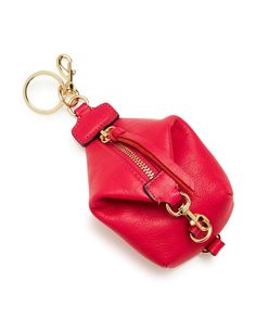 a red purse keychain on a white background