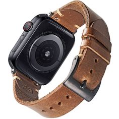 an apple watch with a brown leather band