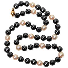 Pretty blush color round 8.5 mm AAA Akoya Pearls enhance the reflective slate gray Hematite beads that create this eighteen inch strand. Said to absorb negative energy and be calming, the hematite round stone beads measure 8mm. The necklace is finished with a 14K yellow gold decorative ball clasp. New,. Gift box. Vintage Beads Necklace, Hematite Beads, Slate Gray, Akoya Pearls, Lovely Jewellery, Blush Color, Pink Pearl, Negative Energy, Bead Necklace