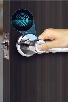 a hand is pressing the button on a door handle with fingerprints and an image of a fingerprint