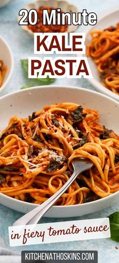 a white bowl filled with pasta on top of a table