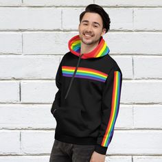 Show off your rainbow pride in this trendy black hoodie with rainbow flag stripes. You'll love how soft, warm and cozy it feels on. Perfect for all your adventures. STYLE GUIDE *Genderless pullover hoodie *Cozy and soft *Brushed fleece fabric inside *Double-lined hood with design on both sides MATERIAL 70% polyester / 27% cotton / 3% elastane 👉 Printed, cut & made to order Please check the Size Guide which can be found in the listing photos and check our FAQ's for further details regarding Rainbow Long Sleeve Sweatshirt For Winter, Rainbow Casual Winter Hoodie, Casual Winter Rainbow Hoodie, Rainbow Cotton Hoodie, Rainbow Long Sleeve Hoodie For Winter, Rainbow Cotton Hooded Hoodie, Rainbow Long Sleeve Winter Hoodie, Rainbow Cotton Sweatshirt For Winter, Rainbow Long-sleeve Winter Hoodie