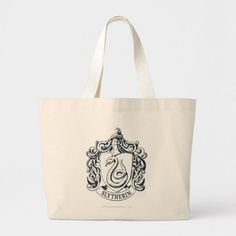 a black and white image of a coat of arms tote bag on a white background