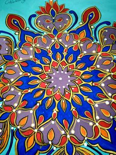 an artistic painting with blue, orange and red colors on it's surface in the shape of a flower