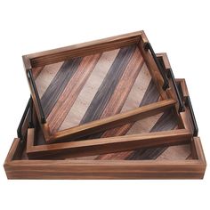 three wooden trays stacked on top of each other with black handles and wood strips