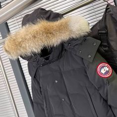 Conquer the cold in timeless style with this Canada Goose Expedition Parka Jacket. Its classic design, cozy fur-trimmed hood, and durable construction ensure warmth and protection from the elements. The signature shoulder patch and iconic branding add a rugged elegance, perfect for urban explorers and outdoor adventurers alike. Canada Goose Wyndham Parka, Canada Goose Expedition Parka, Black Ash, Parka Coat, Fur Hood, Ash Color, Parka Jacket, Equatorial Guinea, Belize