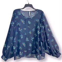 This Zac And Rachel Blue Floral Poet Sleeve Blouse Top Is Brand New With Tags In A Size Large. It Is Nice And Lightweight, Great For Layering, Dress It Up Or Wear With Jeans. Great Tones Of Navy Blue, Teal, Turquoise And Green. The Poet Sleeves Are Fun And Flirty. Super Comfy And Easy To Launder. Approx. Measurements Laying Flat: Pit To Pit - 21” Shoulder To Hem - 25” This Qualifies For My 3 For $30 Deal. Add This Item To Your Bundle With 2 Other Items That Also Qualify And I Will Offer The $30 Blue Floral Print Blouse For Fall, Blue Floral Print Blouse For Party, Blue Flowy Blouse For Party, Striped Chiffon Blouse, Poet Sleeve, Turquoise Blouse, Orange Fits, White Floral Blouse, Striped Shirt Women