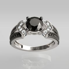 a black and white diamond engagement ring