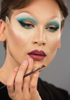 Face, Finger, Lip, Skin, Hairstyle, Chin, Forehead, Eyelash, Eyebrow, Eye shadow, Drake Makeup, Spring Makeup Trends, Violet Chachki, Pride Makeup