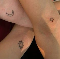 two people with matching tattoos on their legs, one has a crescent and the other has a star