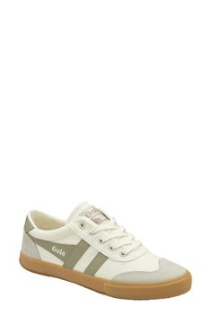 Bold stripes give a sporty vibe to this flexible sneaker that is constructed from soft canvas with supple suede panels. Textile and leather upper/textile lining/rubber sole Imported Gola Badminton, White Feather, Sole Sneakers, White Feathers, Bold Stripes, Badminton, Fashion Inspo Outfits, Womens Sneakers, Rubber Sole