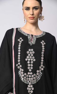 Introducing our enchanting 3-piece Salwar Kameez with Dupatta set, where traditional craftsmanship meets contemporary style. This set features stunning machine embroidery adorned with delicate sequins work, adding a touch of glamour and sophistication to your ensemble. Each piece is meticulously crafted to perfection, ensuring that every stitch and detail exudes elegance and charm. Whether you're attending a festive celebration or a formal event, this Salwar Kameez set promises to elevate your look with its timeless appeal and exquisite craftsmanship. Experience the epitome of luxury and grace with our 3-piece Salwar Kameez set, designed to make you shine on every occasion. Size & Fit Model height is 5’9’ and is wearing a Small sizeMaterial & CareMaterial: Rayon Care: Gentle machine wash i Designer Churidar With Embroidered Border, Transitional Anarkali Set With Embroidered Border, Festival Palazzo Set With Embroidered Border And Traditional Drape, Designer Wear Unstitched Suit With Embroidered Border, Traditional Drape Palazzo Set With Embroidered Border For Navratri, Designer Embroidered Palazzo Set For Navratri, Designer Palazzo Set With Embroidered Border, Navratri Embroidered Palazzo Set In Traditional Drape, Navratri Traditional Drape Palazzo Set With Embroidered Border