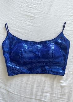 Blue Sleeveless Blouse Piece For Summer, Sleeveless Blue Blouse Piece For Summer, Blue Tank Vest Blouse, Blue Camisole Crop Top With Vest Detail, Blue Sleeveless Blouse Piece, Blue Sleeveless Camisole For Party, Sleeveless Padded Blue Blouse, Sleeveless Blue Blouse Piece, Blue Party Vest Top