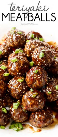 the meatballs are covered in sauce and garnished with scallions on top