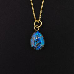 A unique luxury handmade gold pendant necklace containing pieces of Meteorite. The Meteorite is 100% real and authentic. The ring will come with a steel certificate of authenticity. It also contains pieces of opal to give it the beautiful color. The perfect gift for your wife, mother, girlfriend, or any woman in your life. Blue opals are added to give it color. The default necklace chain is 20inches long, 1mm thick, and made from gold. I can change it anywhere from 14 to 30 inches long. Just put Necklace Real Gold, Meteorite Necklace, Real Gold Necklace, Special Symbols, Handmade Gold, Gold Pendant Necklace, Blue Opal, Necklace Chain, Real Gold