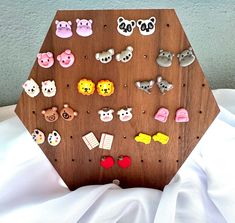 a wooden board with different types of buttons on it