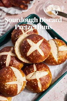 sourdough discard pretzel buns on a tray