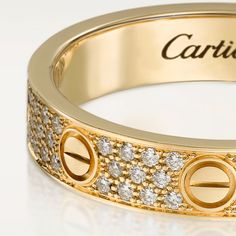 Cartier Gold Ring With Single Cut Diamonds, Cartier Diamond Jewelry For Promise, Cartier Diamond Promise Jewelry, Luxury Bands With Diamond Accents, Cartier Yellow Gold Diamond Ring With Accents, Luxury Gold Bands With Half Eternity, Luxury Yellow Gold Eternity Band For Promise, Luxury Yellow Gold Bands With Diamond Accents, Luxury Gold Half Eternity Band